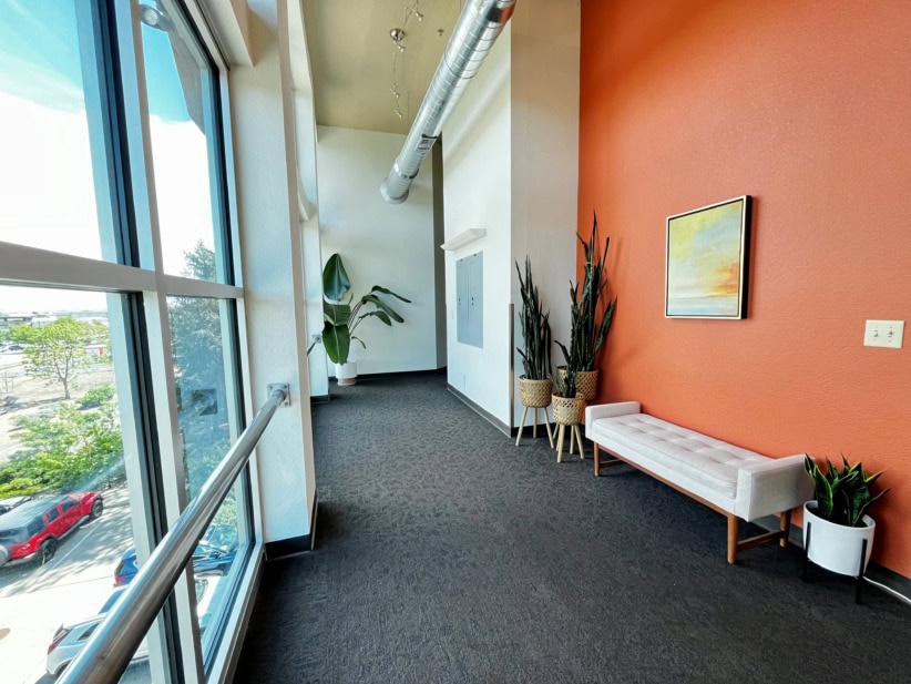 Office Evolution coworking space in Fort Collins with modern decor and natural light.