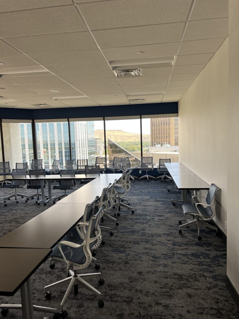Flexible office space with modern conference rooms at Office Evolution coworking center in a downtown high-rise.