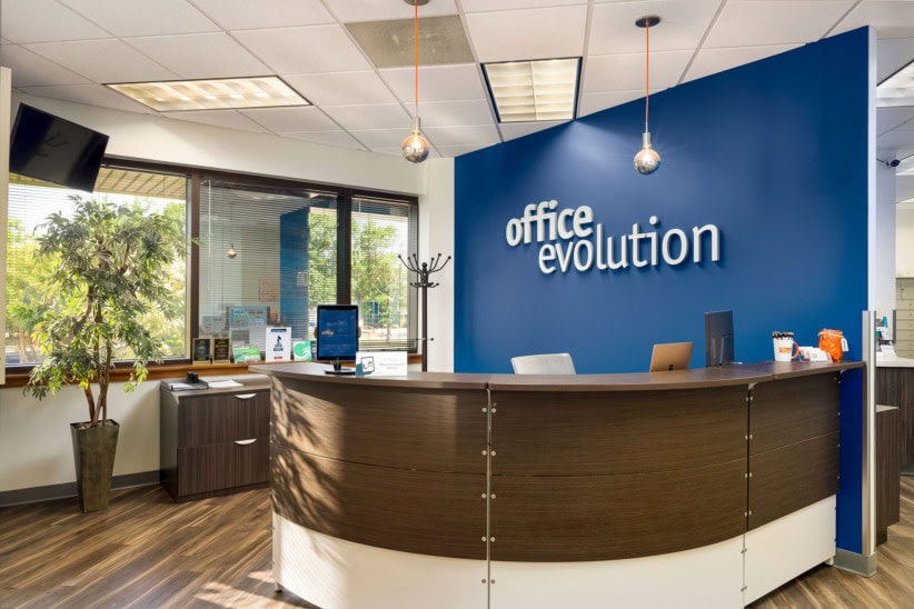 Office Evolution coworking space reception area in Greensboro.