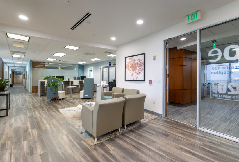 Modern office waiting area with comfortable seating and contemporary decor at Office Evolution.
