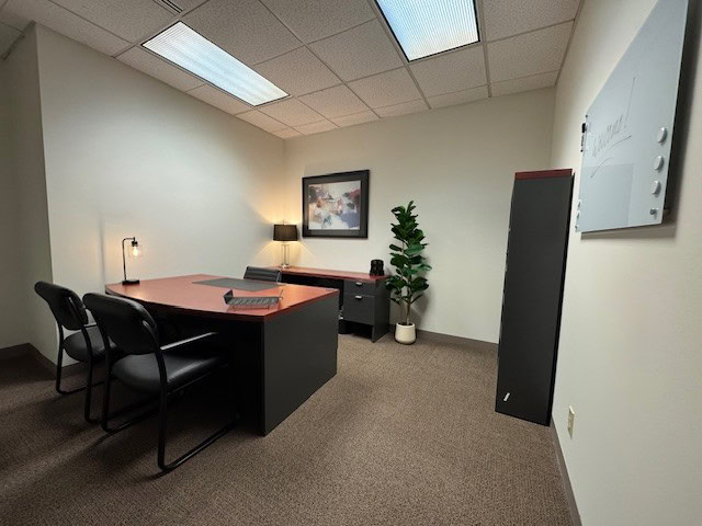 Modern office with desk, chairs, and decor in Columbus Worthington.