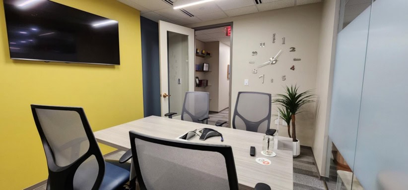 Modern office meeting room with conference table and chairs at Office Evolution.