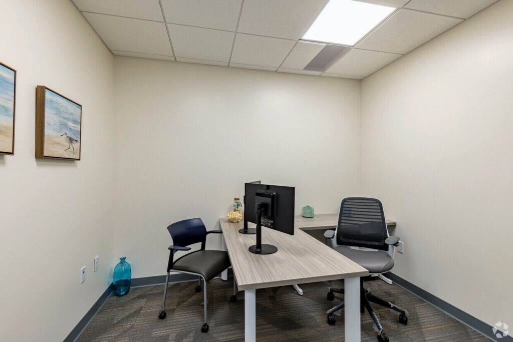 Private Office: Fully furnished private office in Matawan, New Jersey, with natural light, ergonomic chairs, and plenty of storage for maximum comfort and productivity.