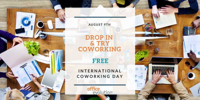 A flyer on top of a coworking desk that says "free cowork day"