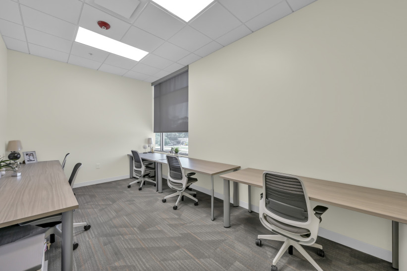 Office renovation with modern desks and ergonomic chairs at Office Evolution.