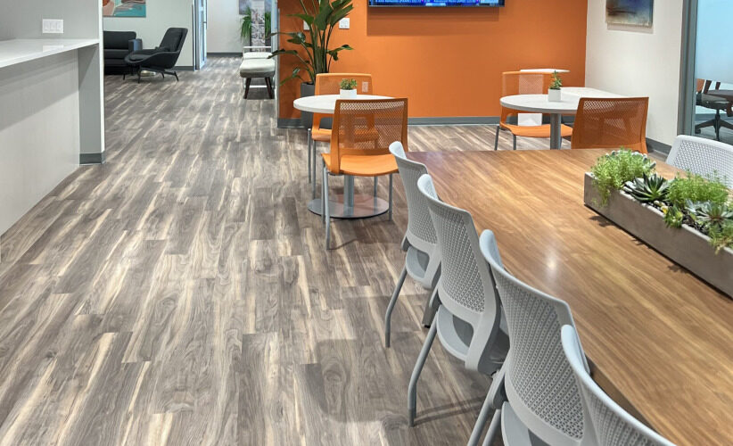 Modern coworking space with flexible office furniture and collaborative areas at Office Evolution.