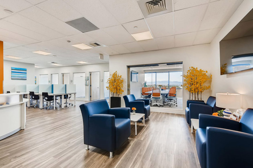 Modern coworking office space with comfortable seating and meeting rooms at Office Evolution.
