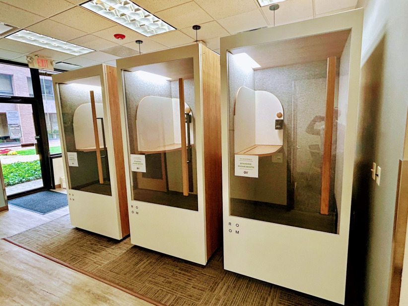 Phone booths for private calls at Office Evolution, coworking space, professional workspace, private call booths, flexible office solutions.