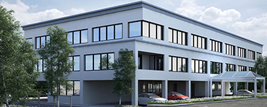 Office evolution modern office building exterior with large windows and landscaped surroundings.