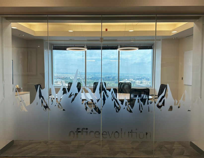 Flexible coworking office space with modern conference room and city views.