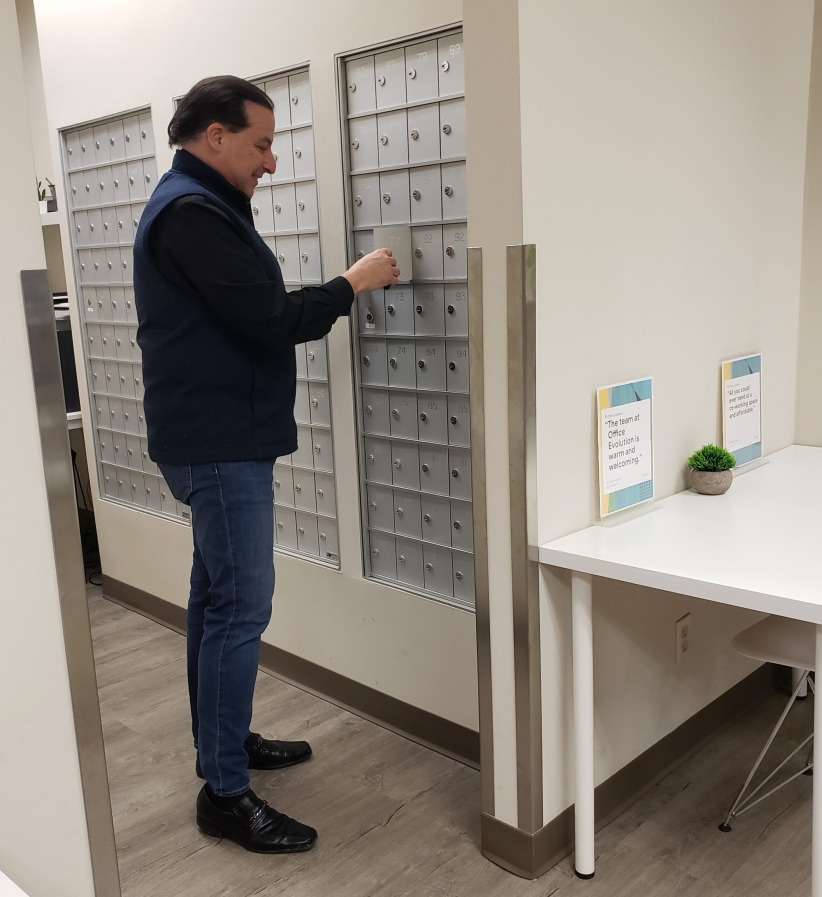 Mailbox system at Office Evolution coworking space, modern shared office environment, secure mail delivery, professional workspace.