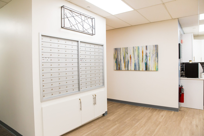 Lockers with mailboxes at Office Evolution coworking space.