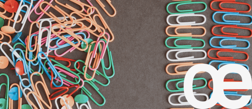 Colorful paper clips and binder clips for office organization and productivity at Office Evolution.