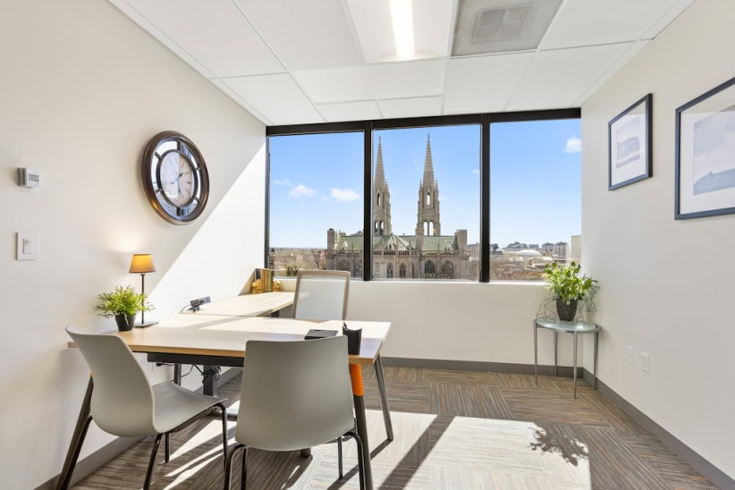 Modern office meeting room with city view at Office Evolution, flexible coworking and private office solutions.