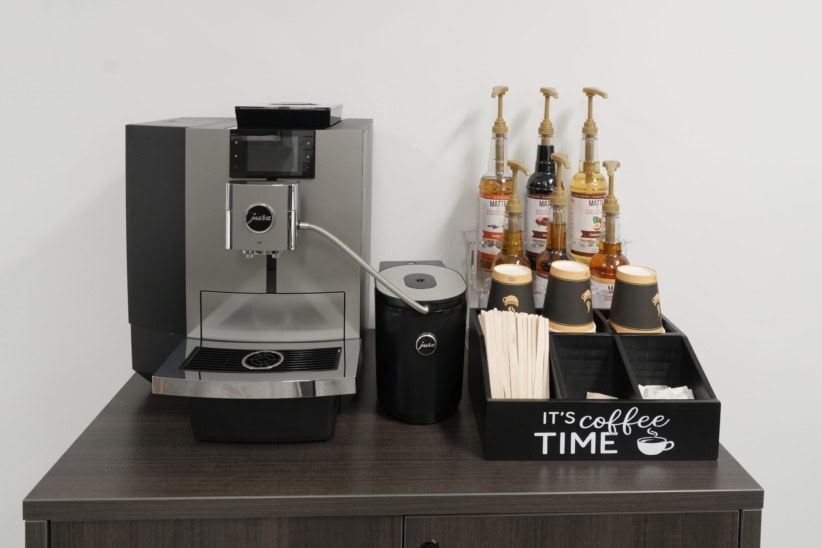 High-quality coffee machine with syrups and cups at Oakville office. Perfect for employee refreshmen.