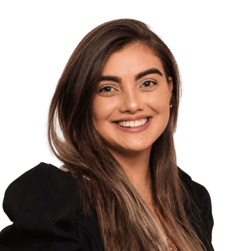 Professional woman smiling in an office setting for About Us page.