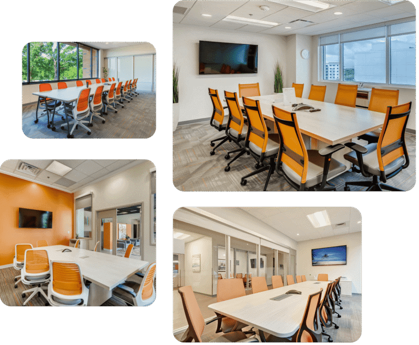 Modern office meeting rooms with large tables and comfortable chairs.