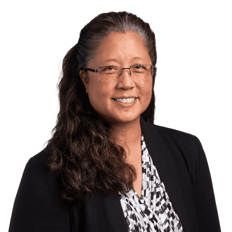 Professional woman smiling, wearing glasses and a black blazer for Office Evolution.