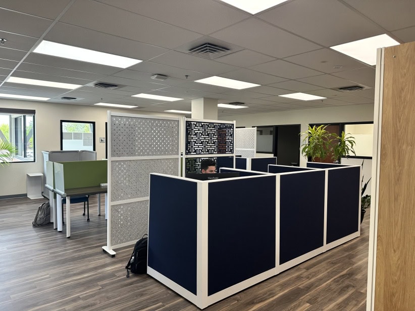 Modern office workspace with cubicles and natural light at Savannah Gateway.